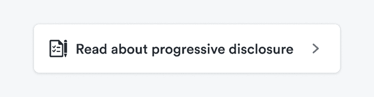 A tile with two icons showing that the tile leads to a link and the text 'Read about progressive disclosure'.